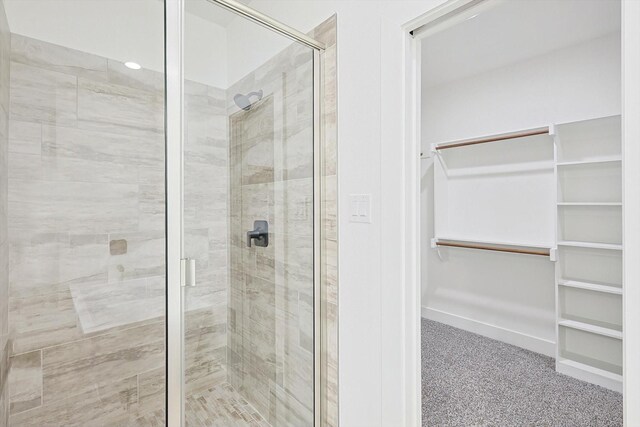 bathroom with an enclosed shower