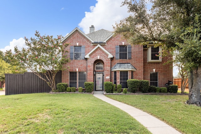 front of property featuring a front lawn