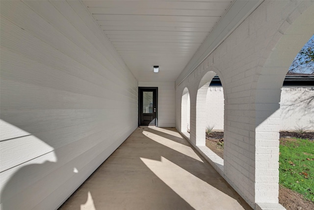 property entrance with a patio