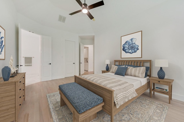 bedroom with ceiling fan and light hardwood / wood-style flooring