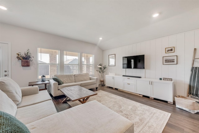 living area with lofted ceiling, dark wood-style floors, and recessed lighting