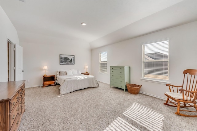 bedroom featuring lofted ceiling, recessed lighting, light colored carpet, and baseboards