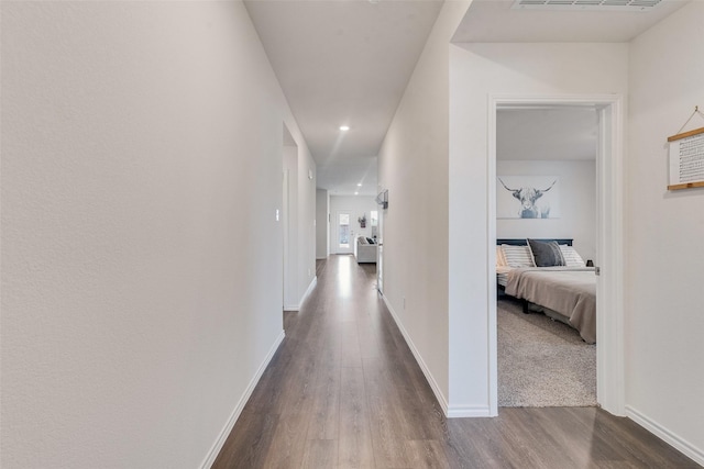 hall featuring hardwood / wood-style flooring