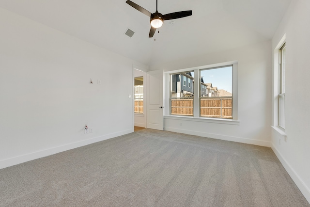 carpeted empty room featuring ceiling fan