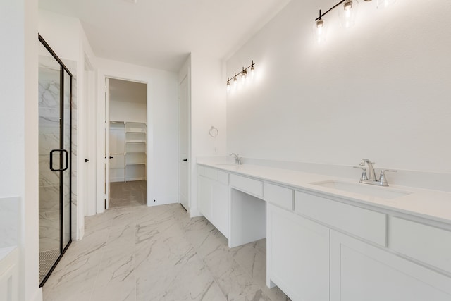 bathroom with vanity and walk in shower