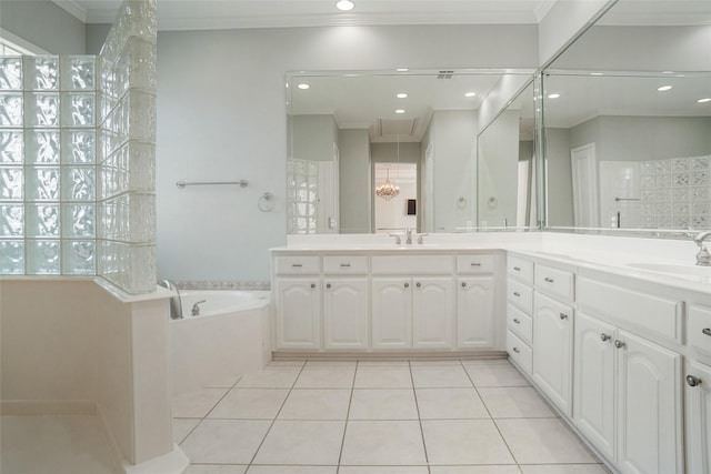 bathroom featuring tile patterned floors, vanity, ornamental molding, and tiled tub