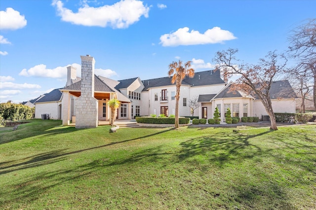 view of front of house with a front lawn