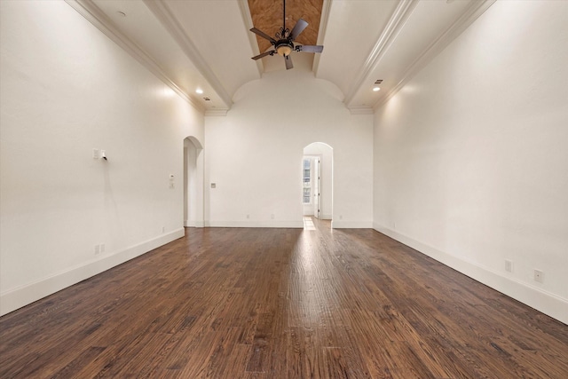 unfurnished living room with brick ceiling, ceiling fan, dark hardwood / wood-style flooring, and high vaulted ceiling