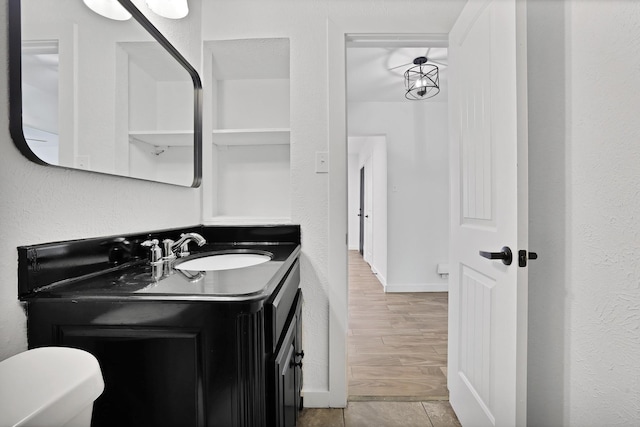 bathroom with tile patterned floors and vanity