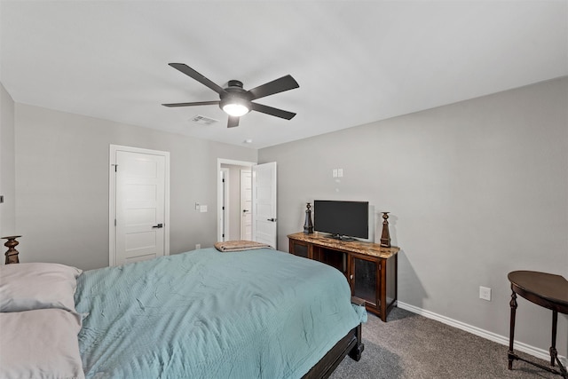 bedroom featuring dark colored carpet and ceiling fan