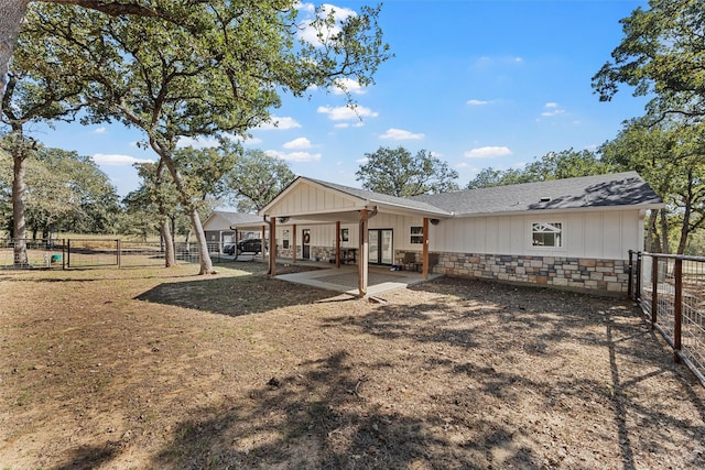 rear view of house with a patio