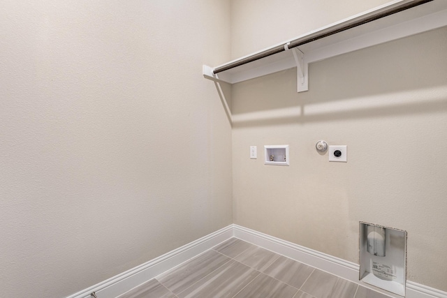 laundry room featuring gas dryer hookup, washer hookup, and hookup for an electric dryer