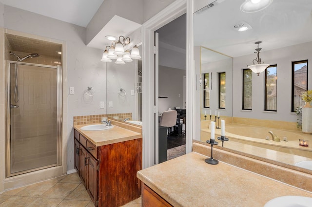 bathroom with tile patterned flooring, vanity, and a shower with door