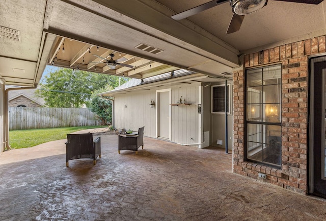 view of patio / terrace featuring ceiling fan