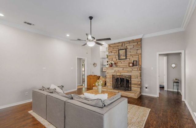 living room featuring a fireplace, crown molding, dark hardwood / wood-style flooring, and ceiling fan