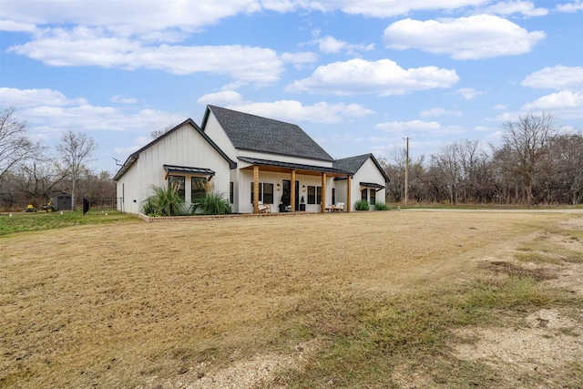 back of house with a porch