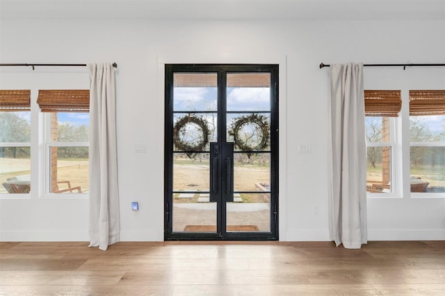 doorway featuring light hardwood / wood-style flooring