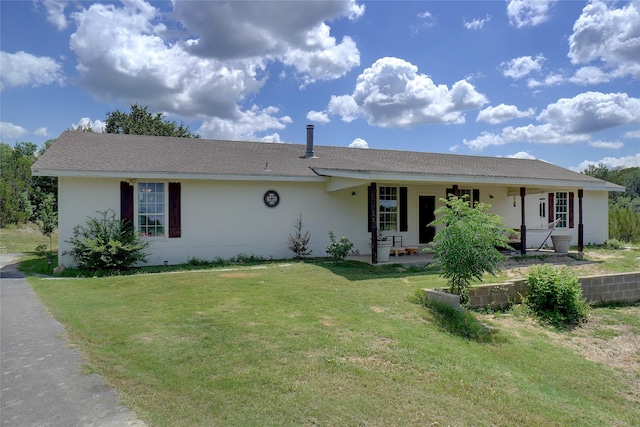 ranch-style house with a porch and a front lawn