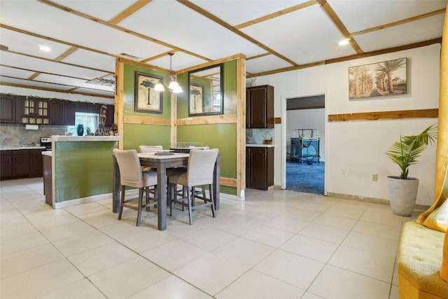 dining space with light tile patterned floors