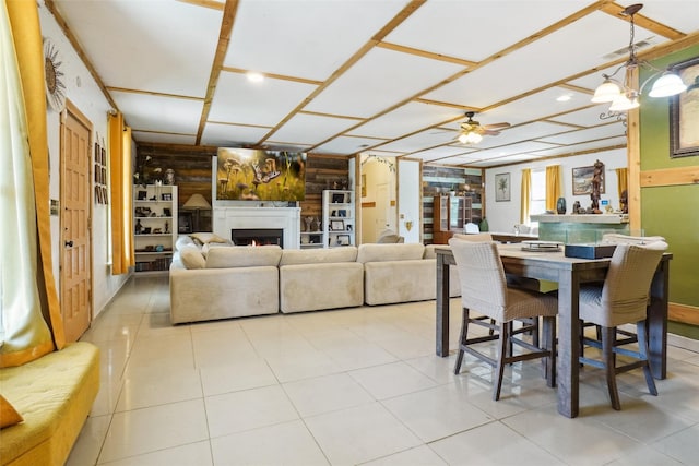 tiled dining area featuring ceiling fan