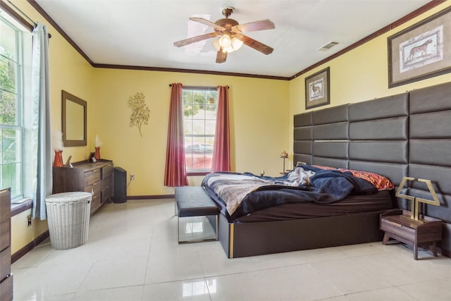 bedroom featuring ceiling fan, crown molding, and light tile patterned floors