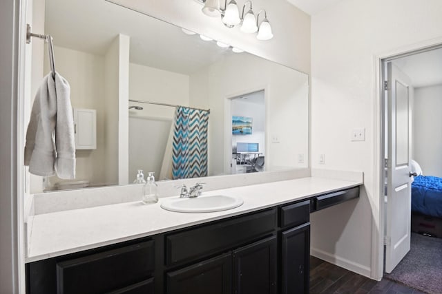 bathroom featuring vanity and walk in shower