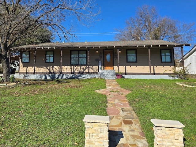 view of front of house featuring a front lawn and covered porch