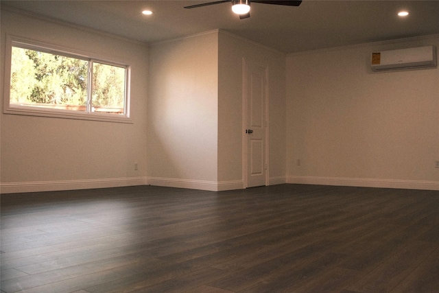 empty room with ceiling fan, an AC wall unit, crown molding, and dark hardwood / wood-style flooring