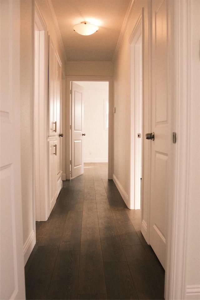 hall featuring ornamental molding