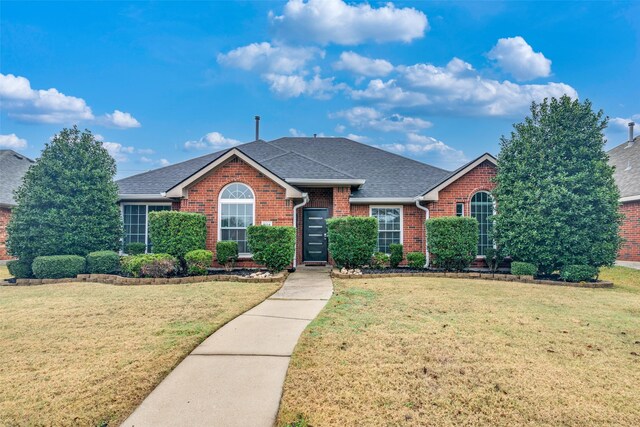 view of front of home with a front yard