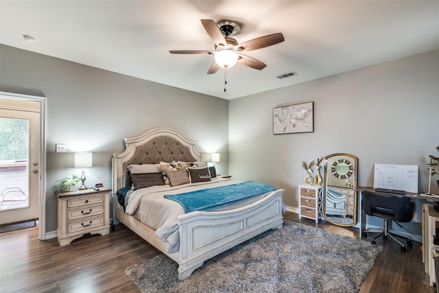 bedroom featuring ceiling fan and dark wood-type flooring