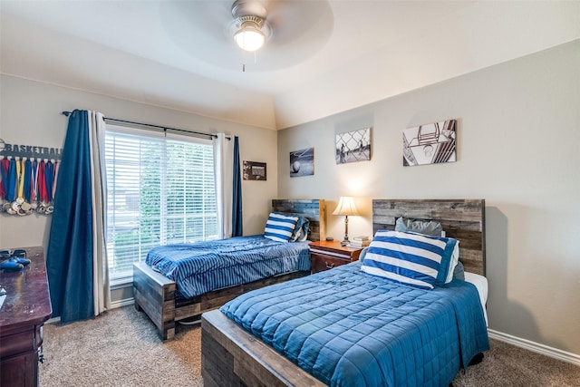 bedroom with carpet flooring, ceiling fan, and vaulted ceiling