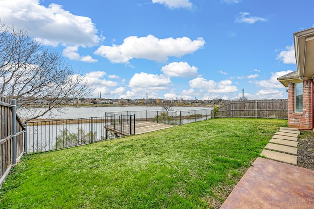 view of yard with a water view