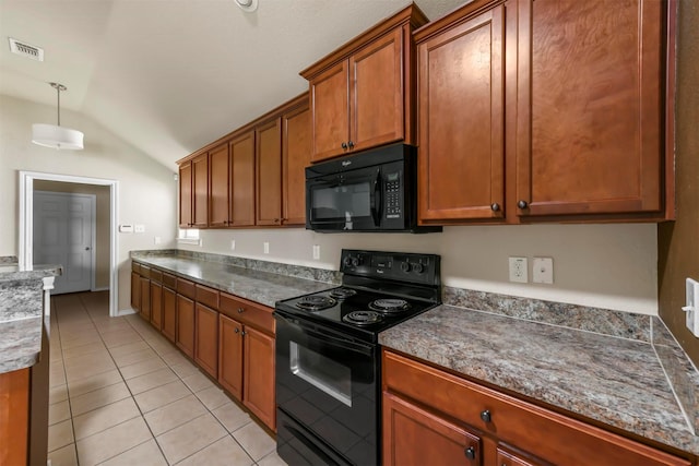 kitchen with light tile patterned floors, vaulted ceiling, hanging light fixtures, and black appliances