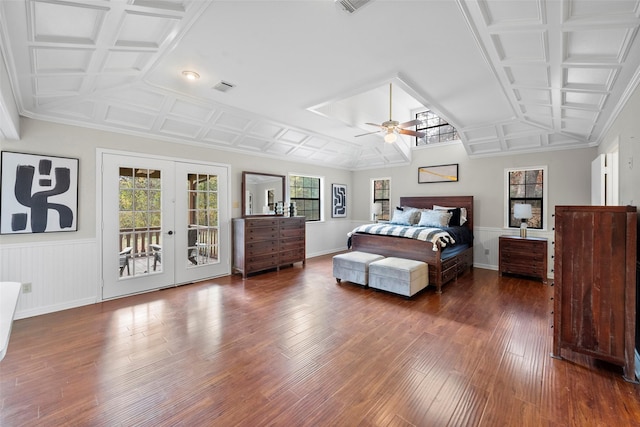 bedroom with multiple windows, dark wood-type flooring, access to outside, and french doors