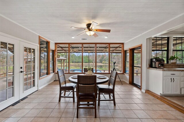 sunroom / solarium featuring french doors, wooden ceiling, and ceiling fan