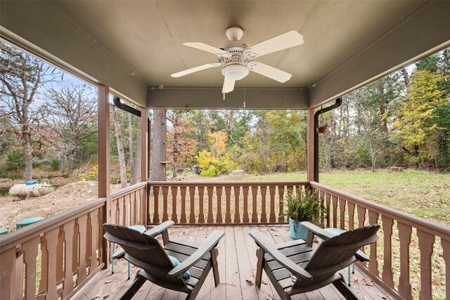 wooden deck with ceiling fan