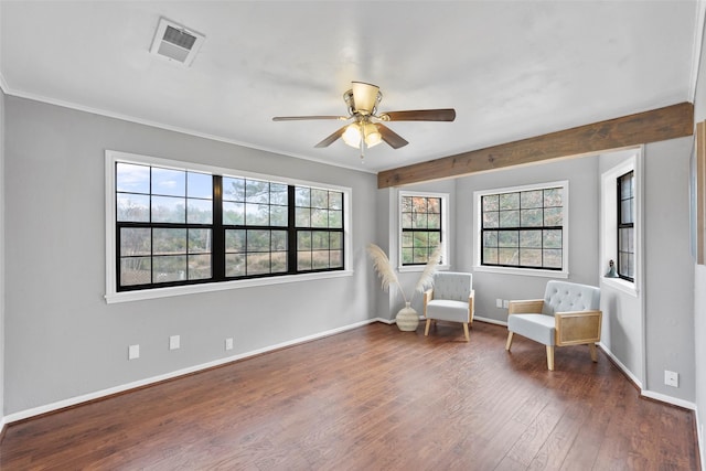 living area featuring beamed ceiling, ceiling fan, and dark hardwood / wood-style flooring