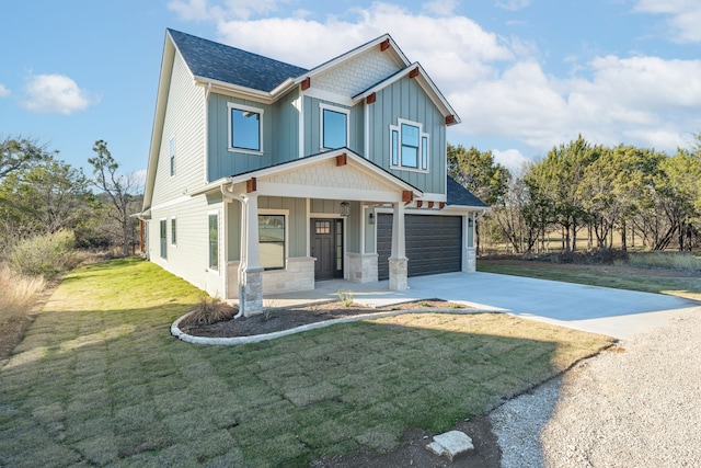 craftsman inspired home featuring a porch, a garage, and a front lawn