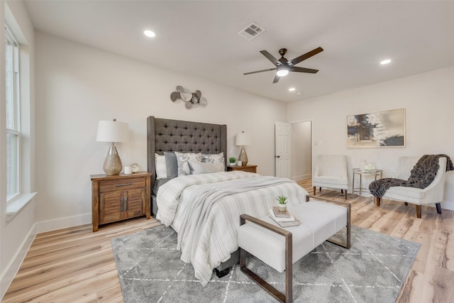 bedroom featuring hardwood / wood-style flooring and ceiling fan