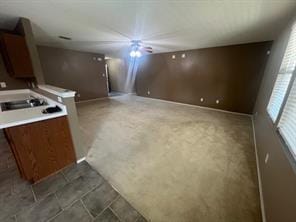 kitchen with dark carpet