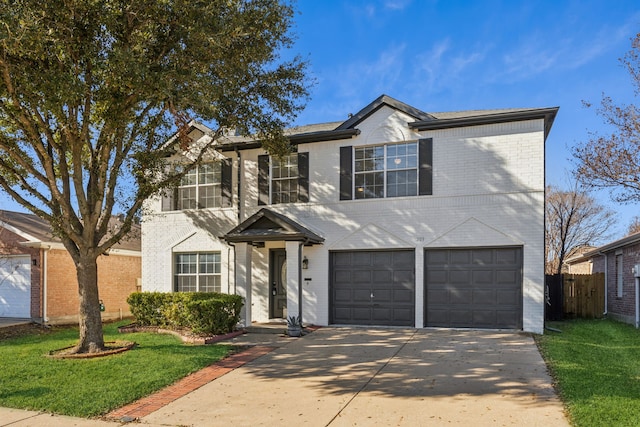 traditional-style house featuring driveway, a garage, fence, and brick siding