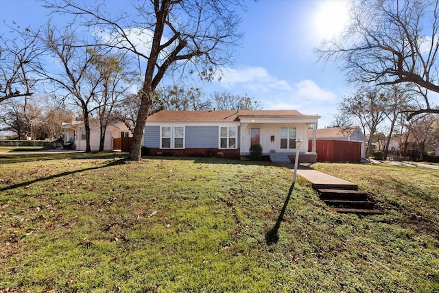 ranch-style house with a front lawn