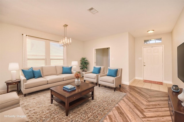 living room with a chandelier