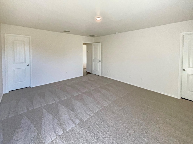 unfurnished room with carpet