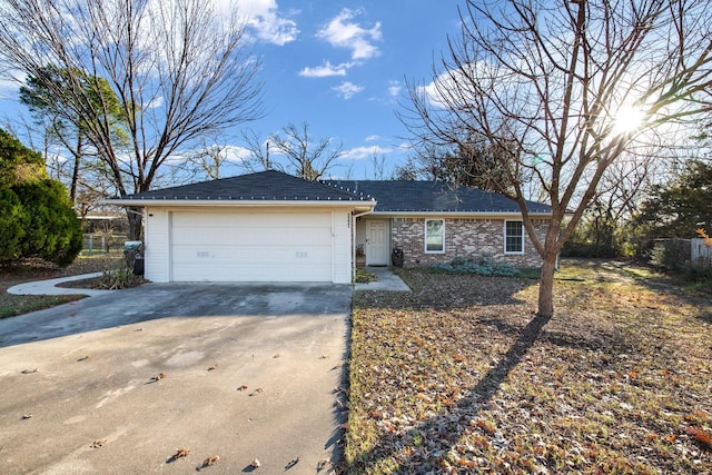 single story home featuring a garage