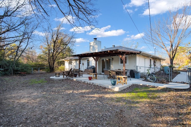 rear view of property with a patio area