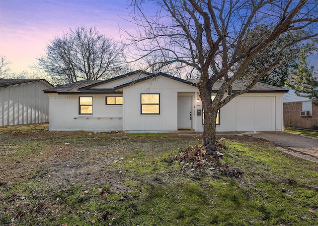 view of front of home with a garage