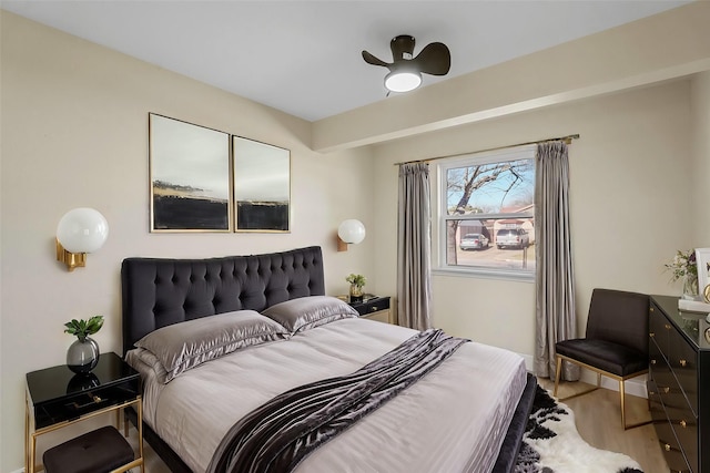 bedroom featuring ceiling fan and light wood-type flooring