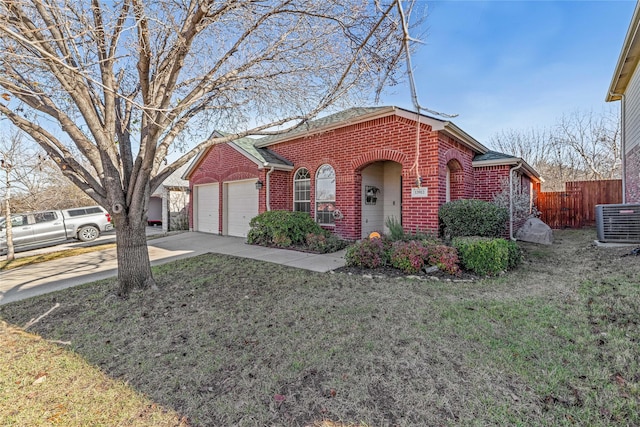 single story home with cooling unit, a garage, and a front lawn